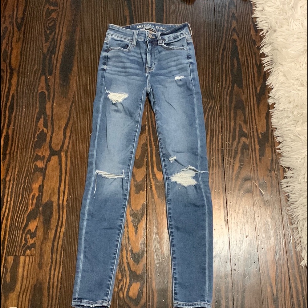 AMERICAN EAGLE RIPPED JEANS 00